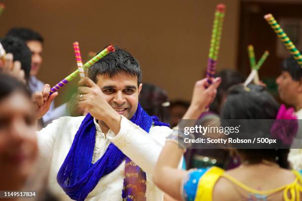 indian dancing at the sanji - dandiya ストックフォトと画像