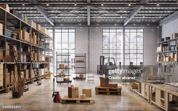 werkslager im inneren - halle gebäude stock-fotos und bilder