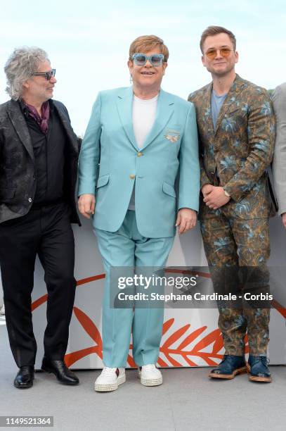 Dexter Fletcher, Elton John and Taron Egerton attend the "Rocketman" Photocall during the 72nd annual Cannes Film Festival on May 16, 2019 in Cannes,...