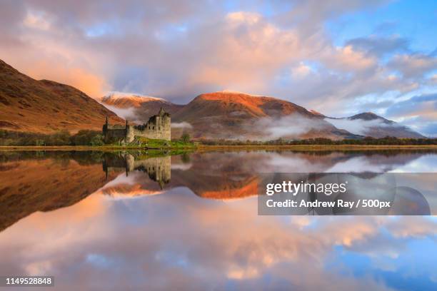 kilchurn castle reflections - kilchurn castle stock pictures, royalty-free photos & images