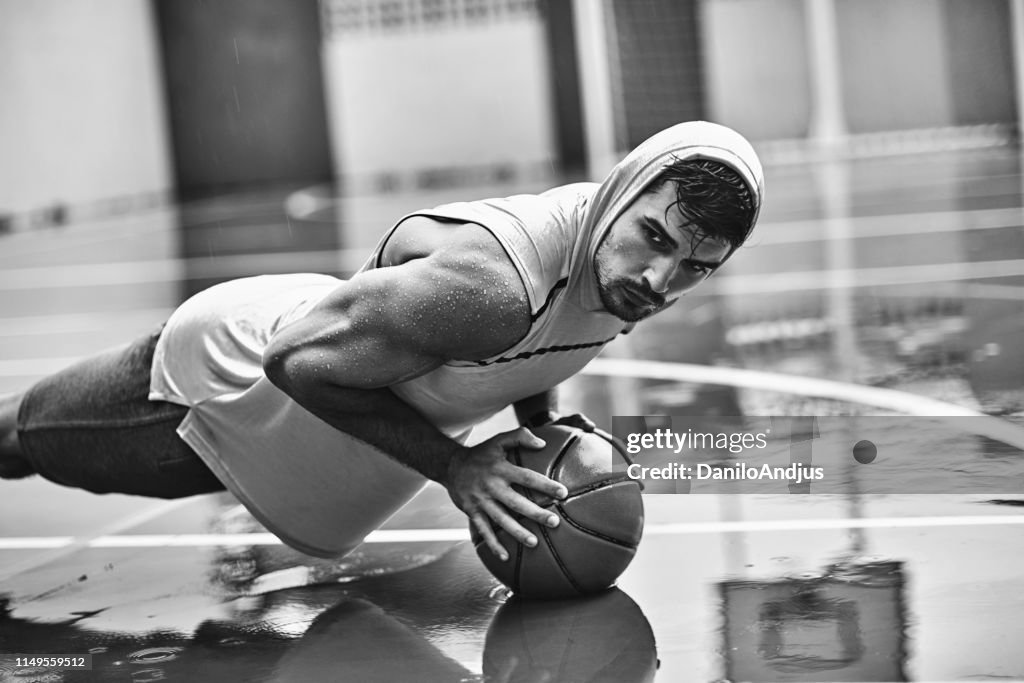 Man exercising on a rainy day