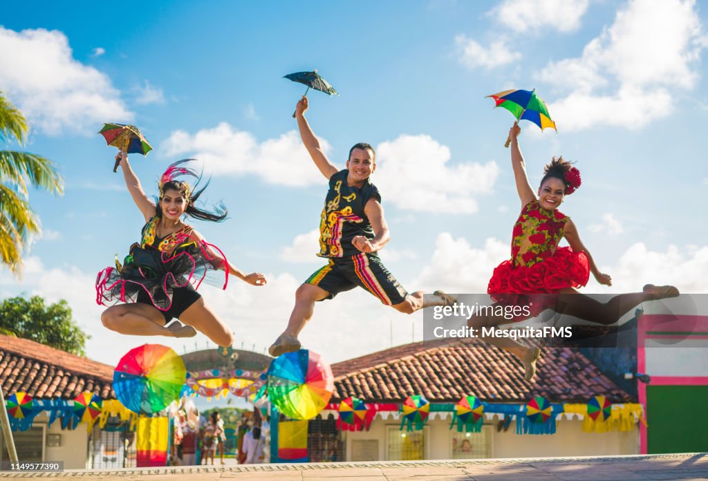 Dancers jumping in the Brazilian Carnival