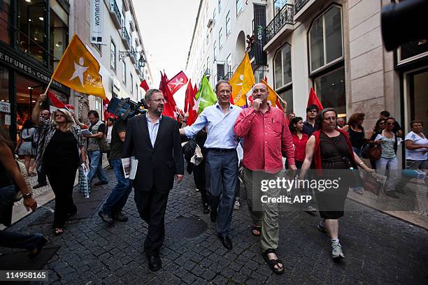 The leader of the left wing Bloco de Esquerda Party Francisco Louca surrounded by supporters on May 31, 2011 during a campaign visit in Lisbon ahead...