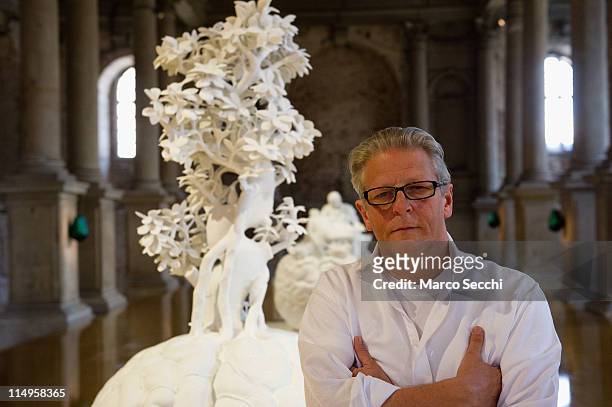 Flemish artist Jan Fabre poses inside Nuova Scuola Grande di S Maria della Misericordia ahead of the press opening of his exhibition "Pietas" on May...