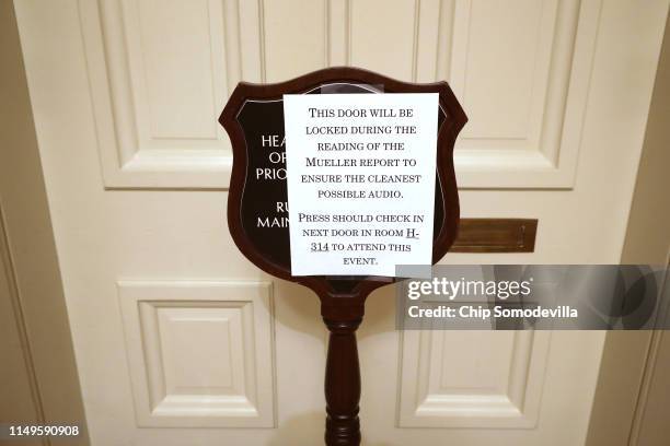 Sign asks people to use another door as House Democrats read all 448 pages of the Mueller Report in the Rules Committee hearing room at the U.S....