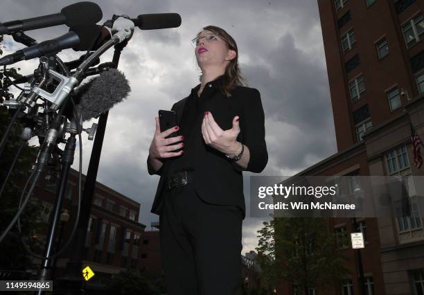 Former U.S. Army intelligence analyst Chelsea Manning addresses reporters before entering the Albert Bryan U.S federal courthouse to appear before a...