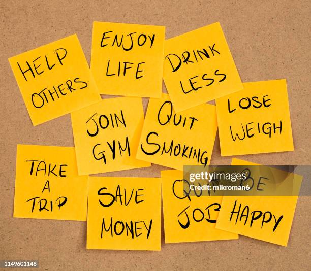 new year resolutions 2020 on sticky notes on a board - new year resolution stock-fotos und bilder