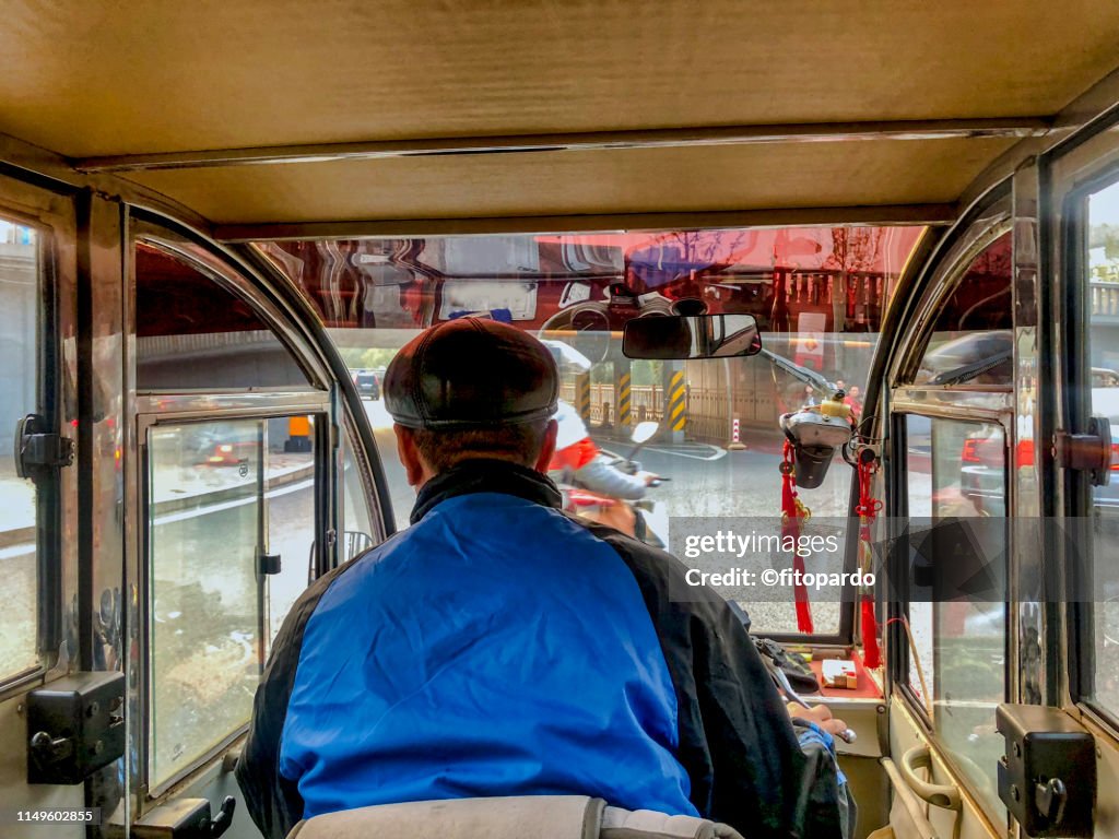 Riding on a Tuk-tuk in Beijing
