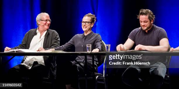 August Zirner, Claudia Michelsen and Ronald Zehrfeld perform live on stage during a reading 'Die Unmoeglichen' at the Admiralspalast on June 12, 2019...