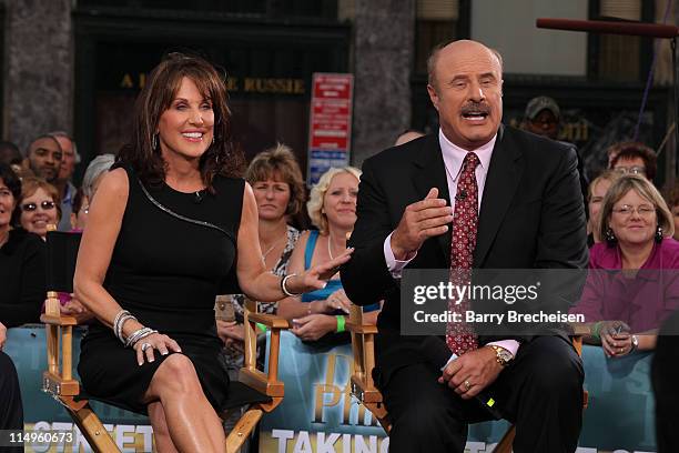 Dr. Phil and wife Robin McGraw promote the launch of the eighth season of his television show "Dr. Phil" on CBS at GM Plaza on September 14, 2009 in...