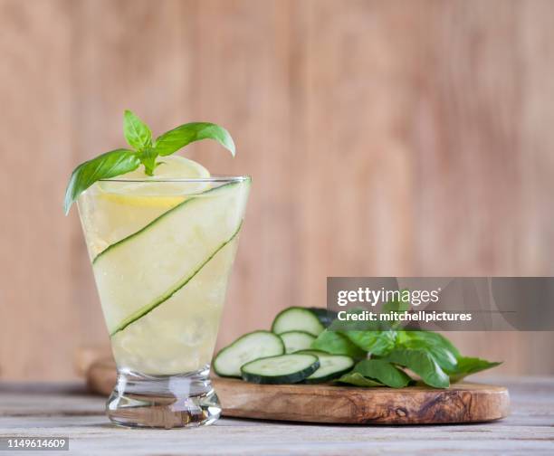 basil cumber cocktail - a vodka soda with lime stock pictures, royalty-free photos & images