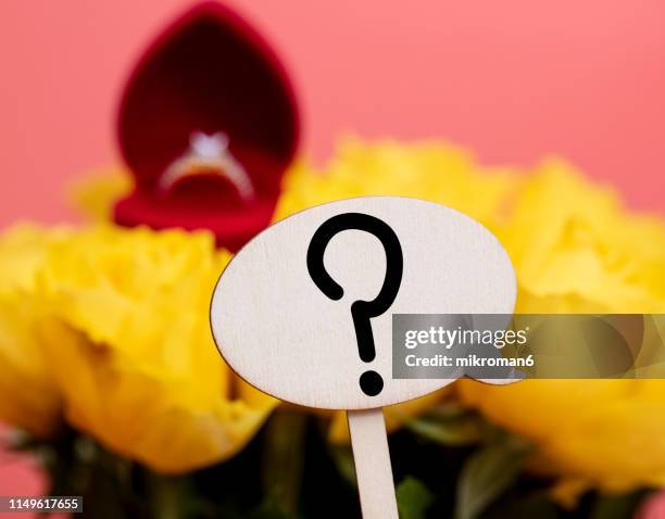 yellow roses with engagement ring and a speech bubble and a question mark - anniversary mark stock pictures, royalty-free photos & images