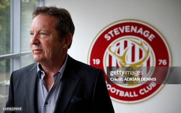 Chairman of Stevenage football club Phil Wallace poses for a photograph at the club's Broadhall Way stadium in Stevenage, north of London, on June...