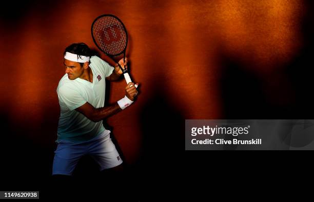 Roger Federer of Switzerland plays a backhand against Borna Coric of Croatia in their Men's Singles Round of 16 match during Day Five of the...