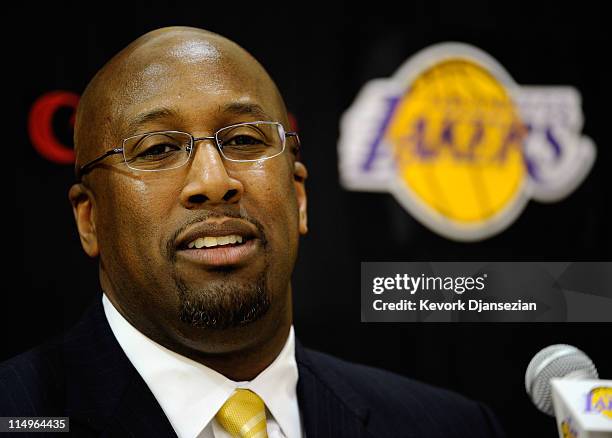 Mike Brown, the new head coach for the Los Angeles Lakers, speaks during his introductory news conference at the team's training facility on May 31,...