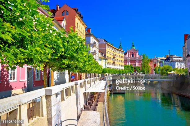 city of ljubljana historic riverfont view - lubiana stock pictures, royalty-free photos & images