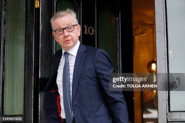 Britain's Environment, Food and Rural Affairs Secretary Michael Gove leaves his residence in London on June 13, 2019. - The 10 candidates running to...