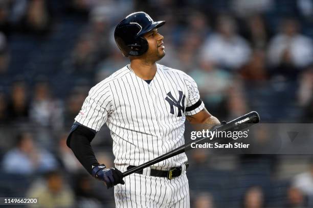 Aaron Hicks of the New York Yankees reacts after striking out during the fifth inning of game two of a double header against the Baltimore Orioles at...