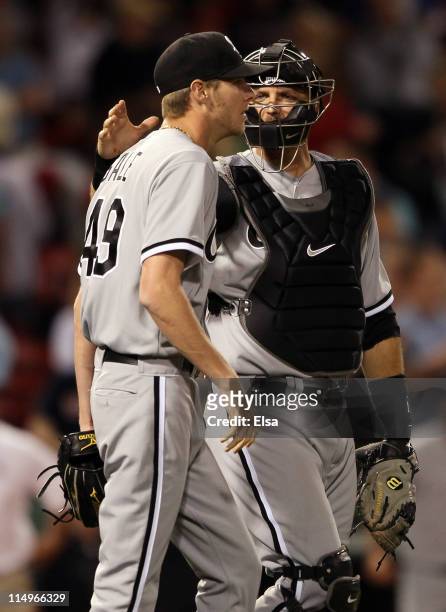 Pierzynski of the Chicago White Sox celebrates the win with teammate Chris Sale on May 31, 2011 at Fenway Park in Boston, Massachusetts. The Chicago...