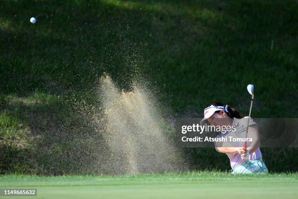 Kotono Kozuma of Japan hits out from a bunker on the 2nd hole during the first round of the Hoken-no-Madoguchi Ladies at Fukuoka Country Club Wajiro...