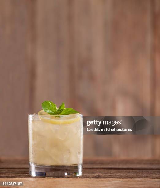 lemon rye smash cocktail - vodka stock pictures, royalty-free photos & images