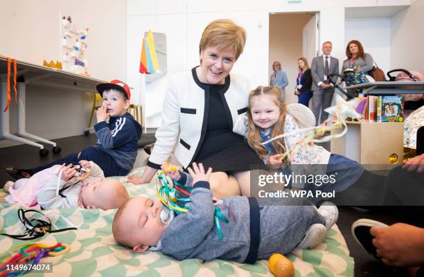 First Minister Nicola Sturgeon meets Gregor MacPhearson Amelia Kenny and Harrison Laurie with babies Emily MacPhearson, 6 months, and Axel Laurie, 5...