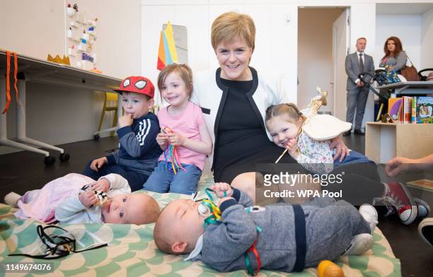 First Minister Nicola Sturgeon meets Gregor MacPhearson Amelia Kenny and Harrison Laurie with babies Emily MacPhearson, 6 months, and Axel Laurie, 5...