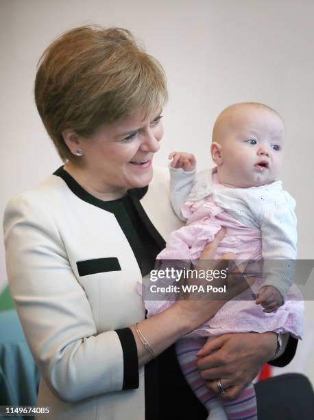 First Minister Nicola Sturgeon meets six-month-old Emily MacPhearson in the Home-Start Dundee pre-school group in the Thomson Learning Centre during...