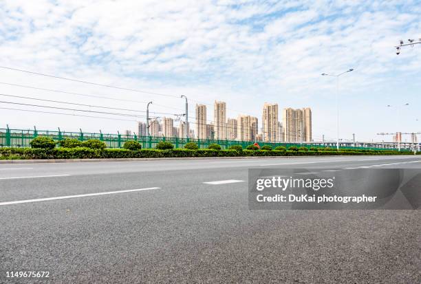 asphalt road - eastern avenue stock pictures, royalty-free photos & images