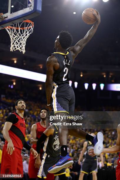 Jordan Bell of the Golden State Warriors dunks the ball against the Portland Trail Blazers in game two of the NBA Western Conference Finals at ORACLE...