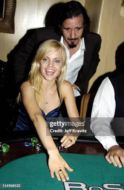 Mena Suvari and husband Robert Brickman during BosPoker.com $100,000 Celebrity Poker Tournament 2004 at Private Residence in Beverly Hills,...