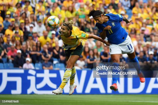 Brazil's forward Cristiane heads the ball and scores a goal during the France 2019 Women's World Cup Group C football match between Australia and...