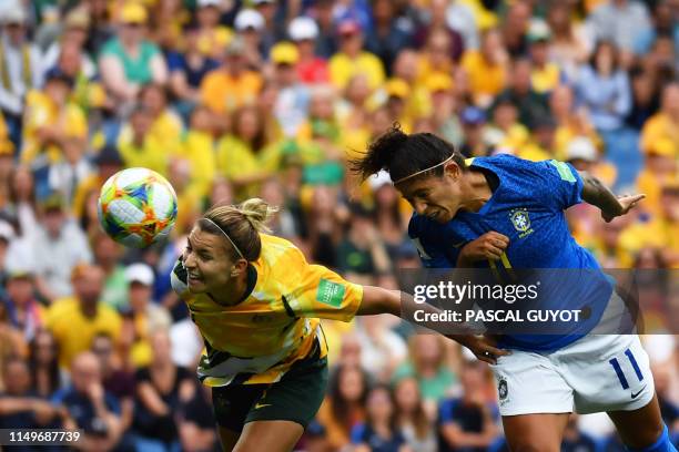 Brazil's forward Cristiane heads the ball and scores a goal during the France 2019 Women's World Cup Group C football match between Australia and...