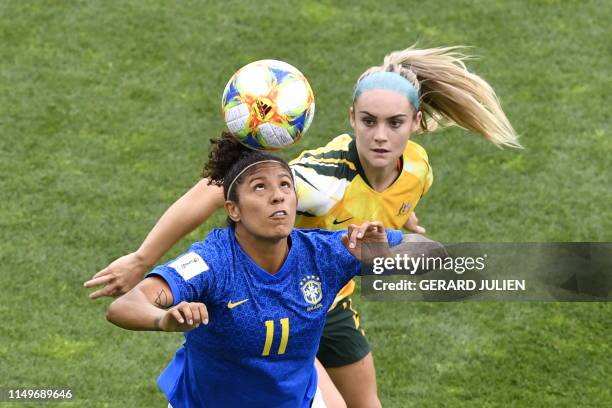 Brazil's forward Cristiane vies for the ball with Australia's defender Ellie Carpenter during the France 2019 Women's World Cup Group C football...
