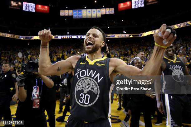 Stephen Curry of the Golden State Warriors celebrates after defeating the Portland Trail Blazers 114-111 in game two of the NBA Western Conference...