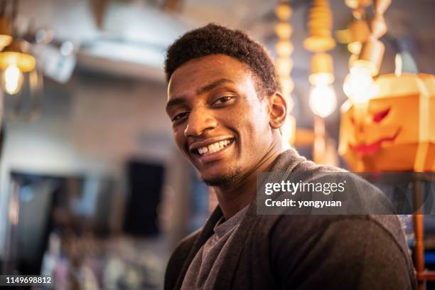 Portrait of an African man in a cafe