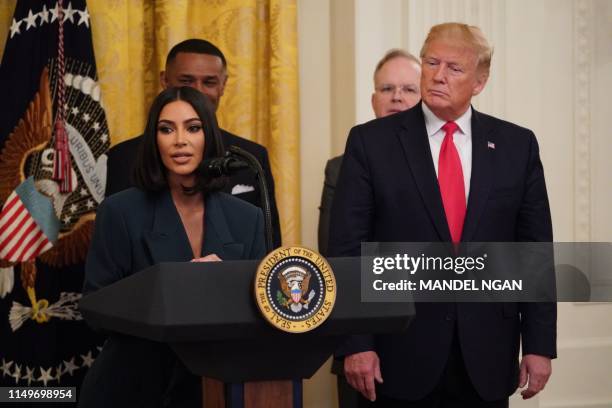 Kim Kardashian speaks as US President Donald Trump holds an event on second chance hiring and criminal justice reform in the East Room of the White...