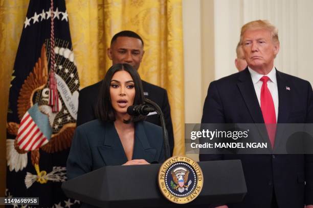 Kim Kardashian speaks as US President Donald Trump holds an event on second chance hiring and criminal justice reform in the East Room of the White...