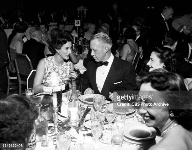 Babe Paley and Frank Stanton talk over dinner during a salute to Jack Benny, held by Friars Club members and guests in honor of Jack Benny on his...