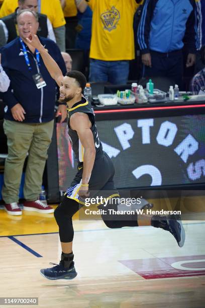 Stephen Curry of the Golden State Warriors celebrates after defeating the Portland Trail Blazers 114-111 in game two of the NBA Western Conference...