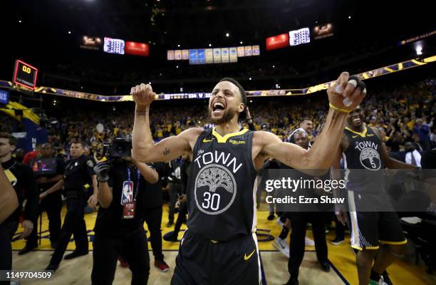 Stephen Curry of the Golden State Warriors celebrates after defeating the Portland Trail Blazers 114-111 in game two of the NBA Western Conference...