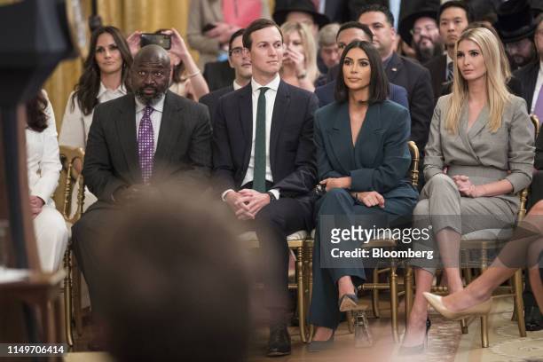 Jared Kushner, from second left, reality star and activist Kim Kardashian West, and Ivanka Trump listen as U.S. President Donald Trump, not pictured,...