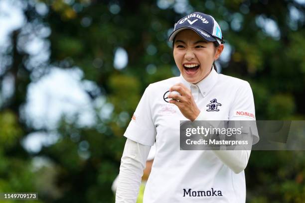 Momoka Miura of Japan celebrates the birdie on the 12th green during the first round of the Hoken-no-Madoguchi Ladies at Fukuoka Country Club Wajiro...