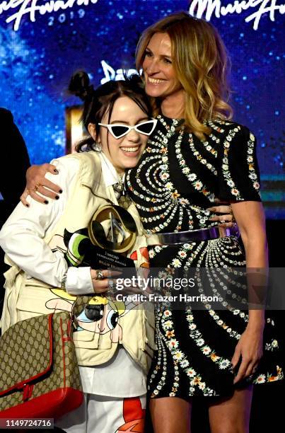 Billie Eilish accepts the Vanguard Award from Julia Roberts onstage 36th Annual ASCAP Pop Music Awards at The Beverly Hilton Hotel on May 16, 2019 in...