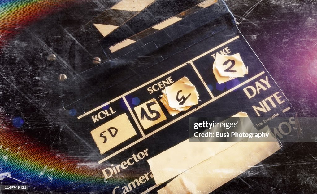 Distressed image of movie clapperboard