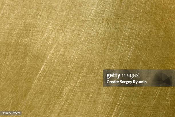 brushed metal surface - messing stock-fotos und bilder