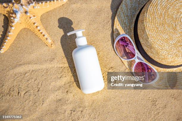 beach accessories on table on beach - summer holidays - sunglasses top view stock pictures, royalty-free photos & images