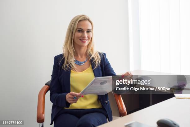 business woman working with documents - notaio foto e immagini stock