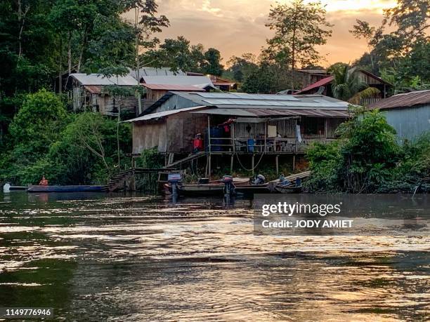 Picture taken on June 11, 2019 shows a general view of Yaopassi, on the Suriname banks of the Saint-Laurent du Maroni river, a base camp for gold...