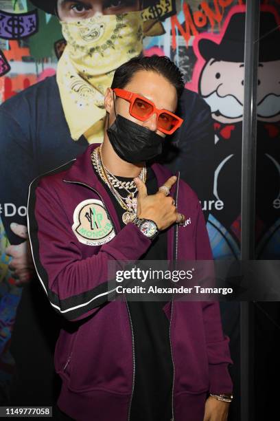 Art Provocateur Alec Monopoly is seen at the ribbon cutting ceremony celebrating the new TAG Heuer Boutique Aventura opening on June 13, 2019 in...